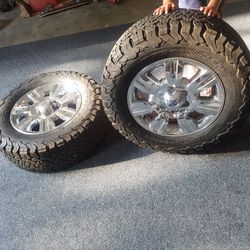 Brand new BF Goodrich tires with chrome Ford wheels
