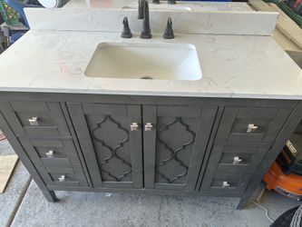 Use Vanity bathroom 48” long 35” high