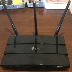 TP link router, good quality per Amazon reviews 