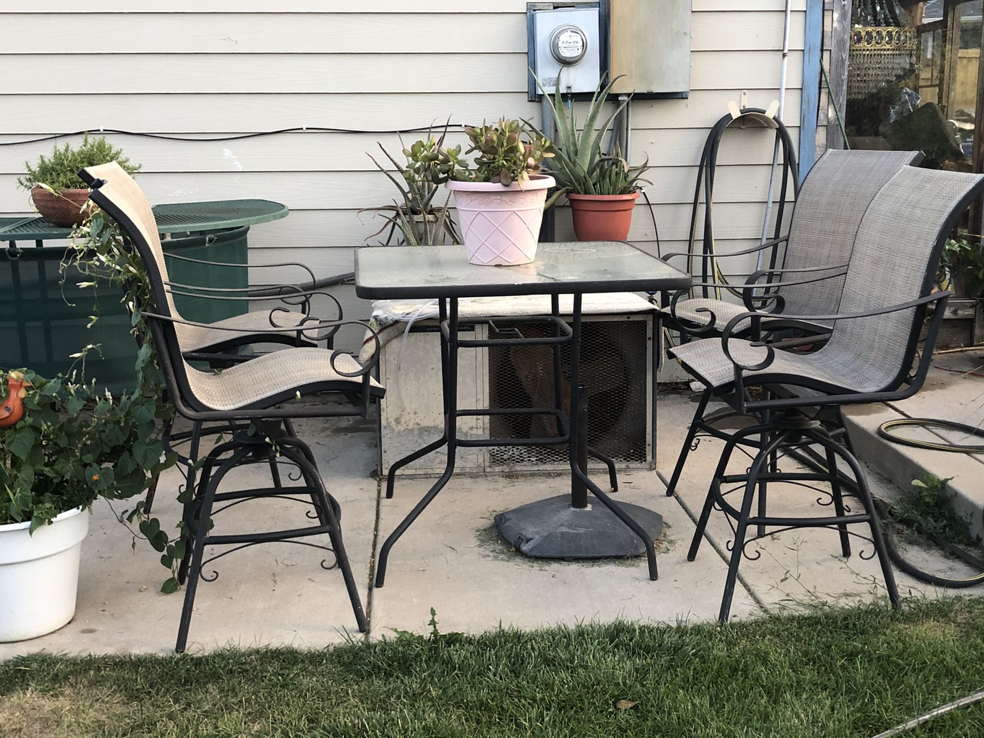 Patio table and swirling chairs