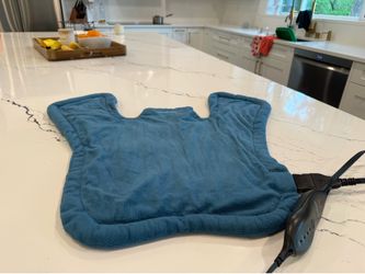 Sunbeam heating pad for neck and shoulder pain relief