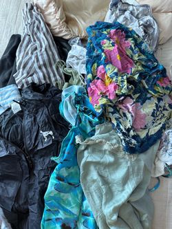 Big pile of women’s clothes