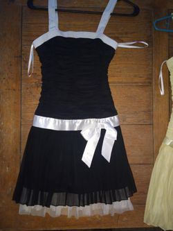 Girls Dresses sizes 14, 8, 12 & red is jrs medium