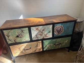 Multicolored small dresser used