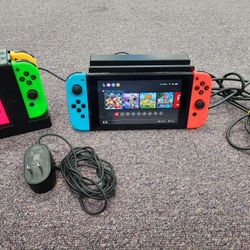 Nintendo Switch V2 (XKW) With Home Console, 4 Extra Joy-Con Controllers, with 4 Position Charging Dock