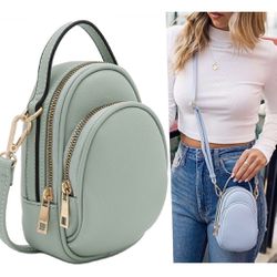 Leather crossbody bag two compartment mini oval in mint color