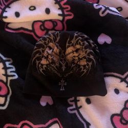 Black affliction skull beanie with cross and flames design