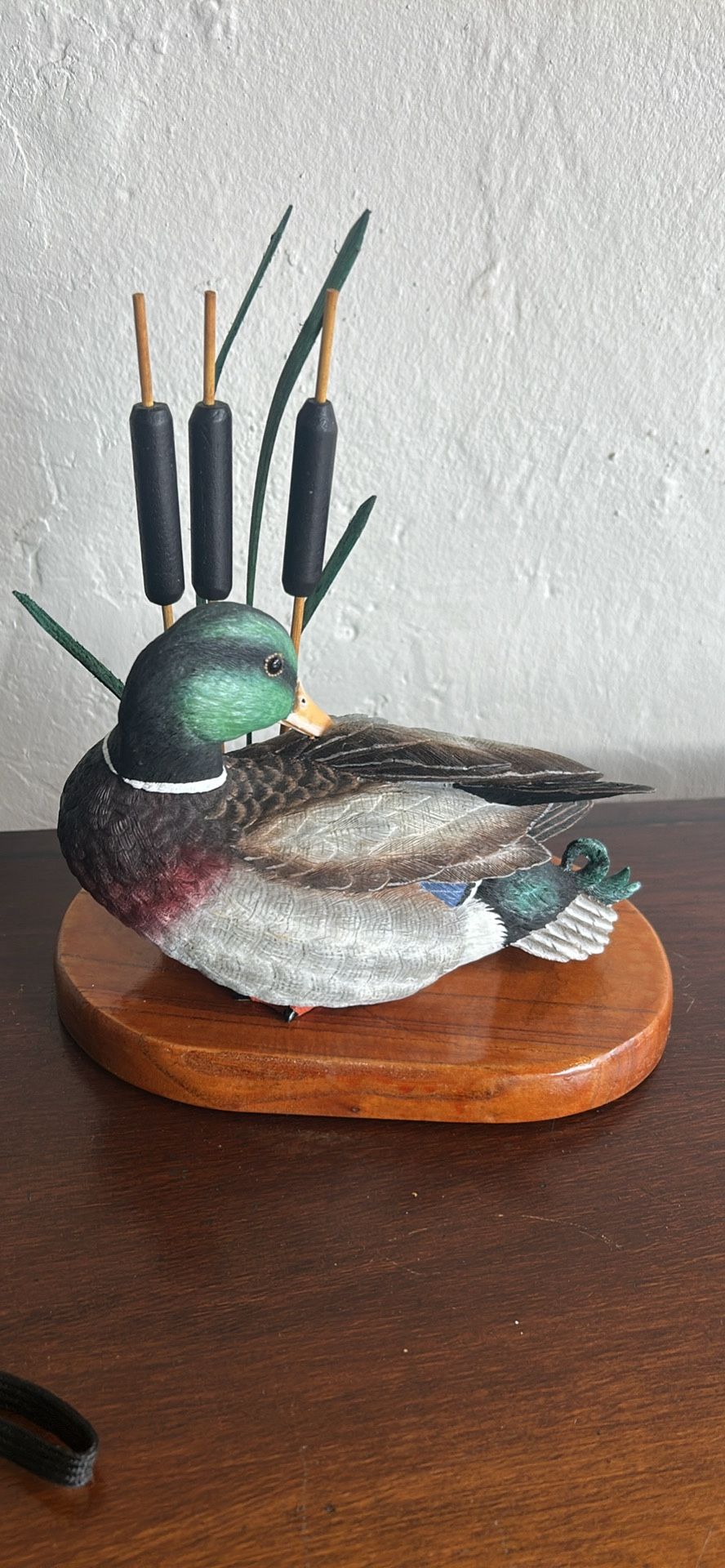 Beautiful mallard duck figurine on wood base