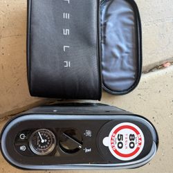 tesla air compressor and tire repair kit Like New $50