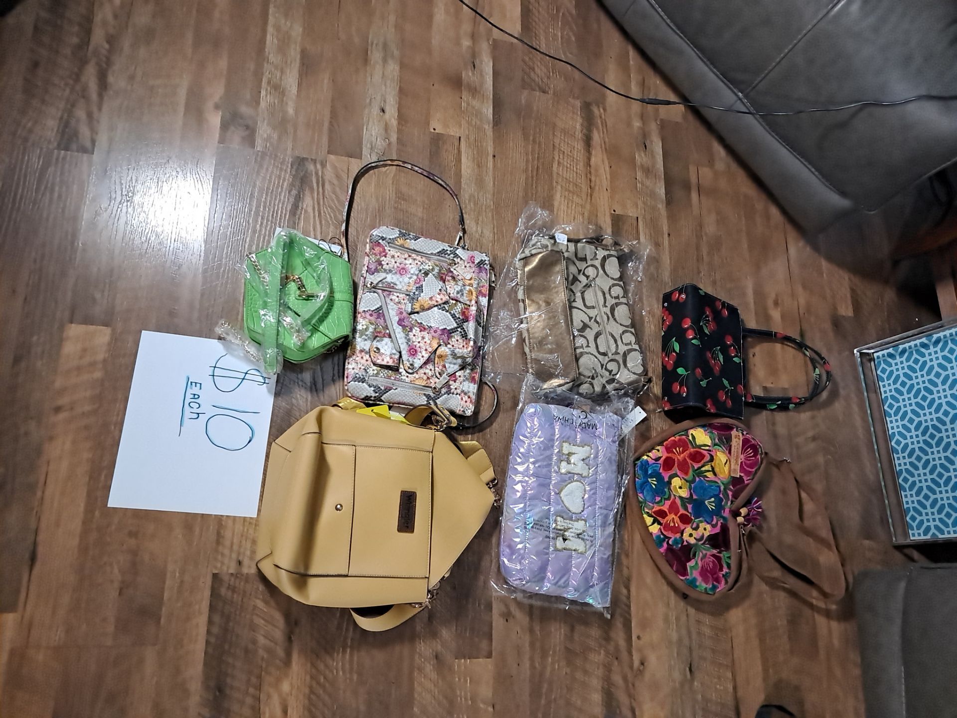 Variety of fashion bags priced at $10 each