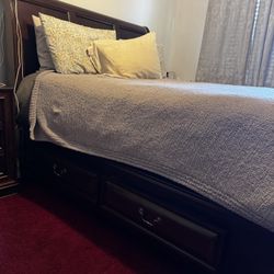 Selling a queen-size bed frame with built-in storage. The bed has 6 total drawers (2 on each side + 2 at the foot of the bed), perfect for clothes, sh
