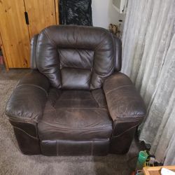 A brown.
 Recliner, rocking chair.