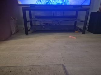 Black Metal and Glass TV Stand