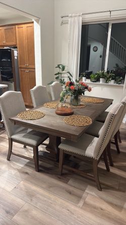 Solid wood trestle dining table