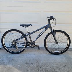 TREK PRECALIBER mountain bike.  Good for age from 8 to 12 year.  24 tires. 7 speed. 12." ALUMINUM frame. Everything works