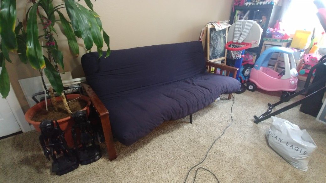 Futon and cherry frame for sale!