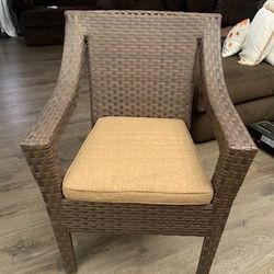 Wicker chair with cushion