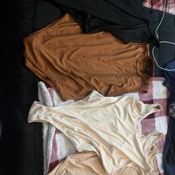 4 brand new bodysuits
