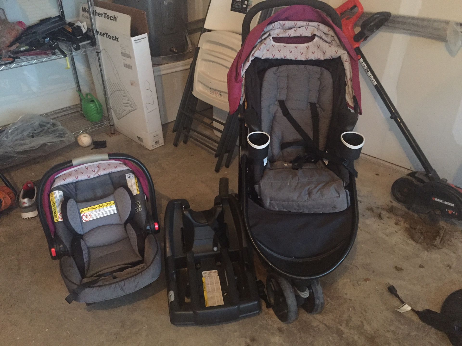 Graco car seat, base, and stroller.