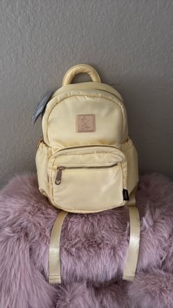 Disney yellow backpack
