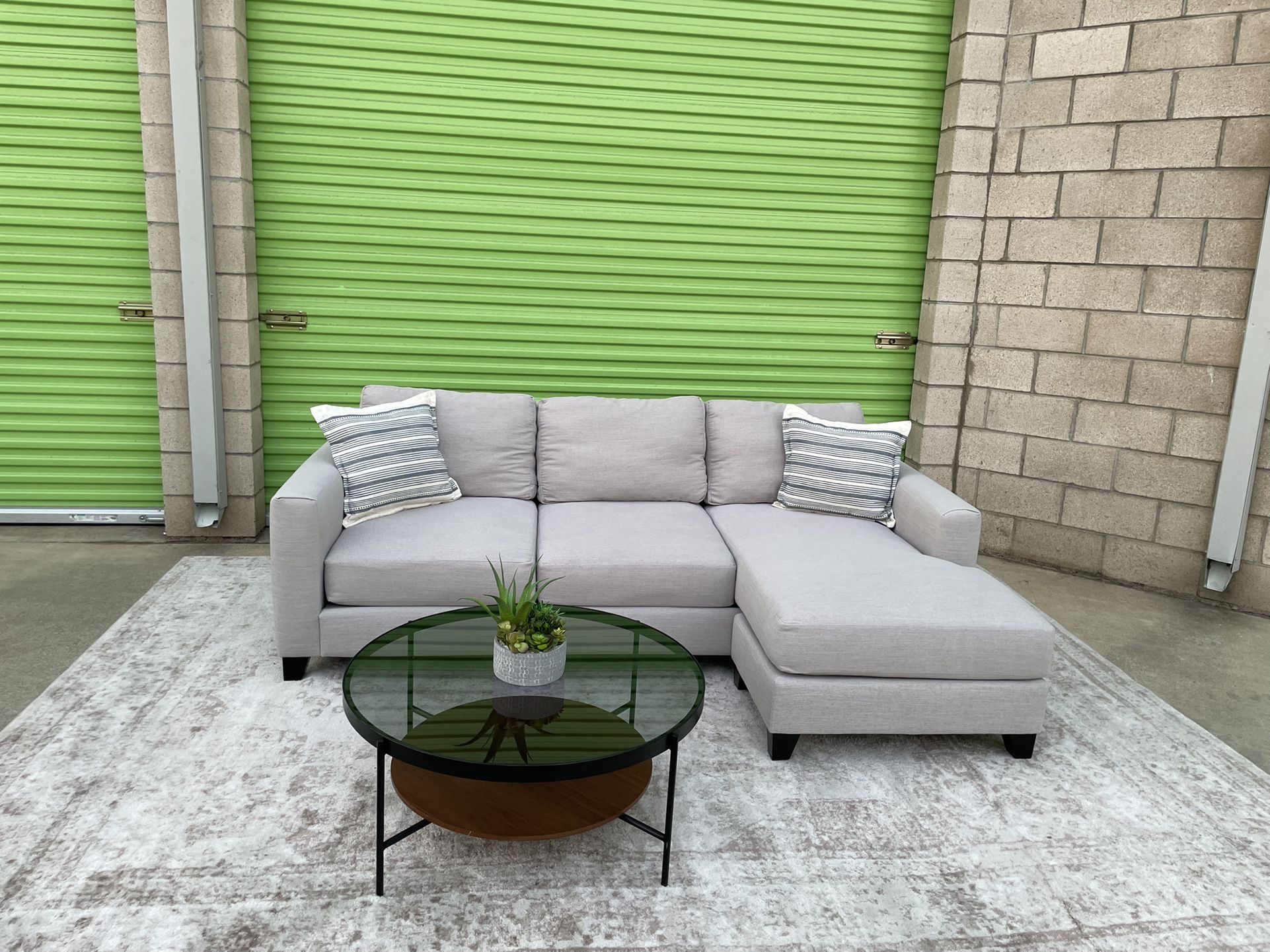 *Free Delivery* Gray Living Spaces Sectional Reversible Chaise