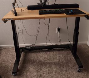 Workbench/Desk adjustable height, mobile rolling casters 46" x 24". Height: 29"-42"