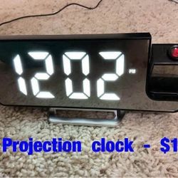 Projection  clock  -  $15