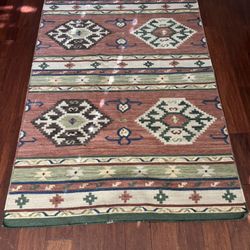 Handwoven Turkish Kilim Rug – 6’2” x 4’ (74” x 48.5”)  This authentic handwoven kilim rug originates from Central Anatolia, Turkey, likely woven in th