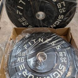 35 LBS Olympic Bumper Plates Set, 2" Weight Plates (70 LBS TOTAL).

(2) 35 LBS.