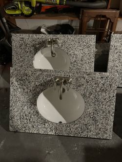 Granite countertops with sink and faucet