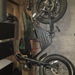 Riding'times Z8 moped-style electric bike, 
Motor: 1500W  up to 50 MPH.