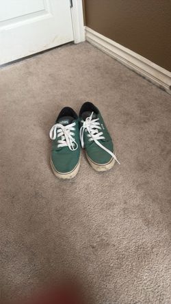 Green etnies sneakers