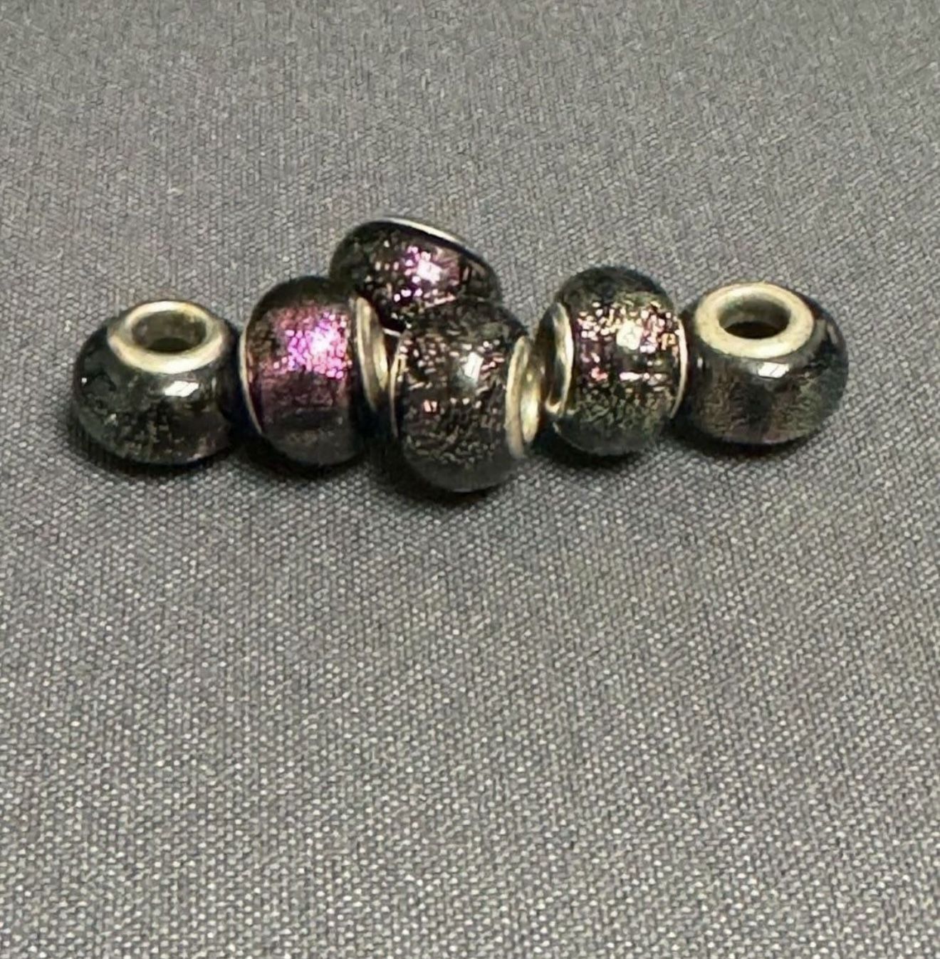 Lot of 6 Vintage glass charm bead black/dark/purple/metallic with silver core In great condition