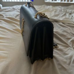 unused black purse