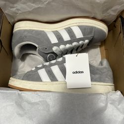 grey and white adidas campus 00s