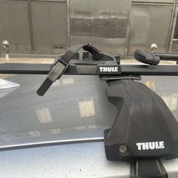 Aero  Thule roof rack with Thule Proride XT bike rack