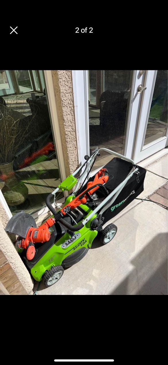 Used GreenWorks Corded Lawn Mower And Black And Decker Corded Weed Wackier. 