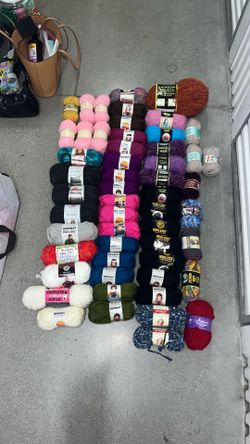 54 rolls of yarn + 16 crochet magazines + 7 crochet guides