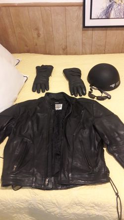 Bikers outfit, black leather jacket, helmet, sunglasses, gloves