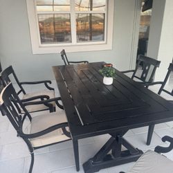 Outdoor 7ft metal patio table and chairs. Need moved ASAP.
