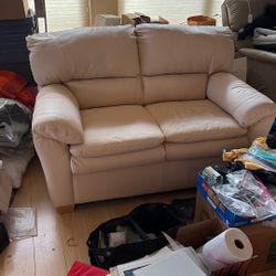 Exquisite plush, comfortable like new leather loveseat