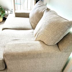 Comfy beige loveseat