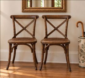 Cross-back dining chairs with cane seats