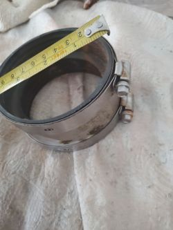 Stainless steel no hub  coupling. Need s clean ing , but not Used.