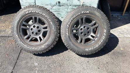 Two 6 Lug dodge Dakota Or Durango 16 Inch aluminum wheels with old tires
