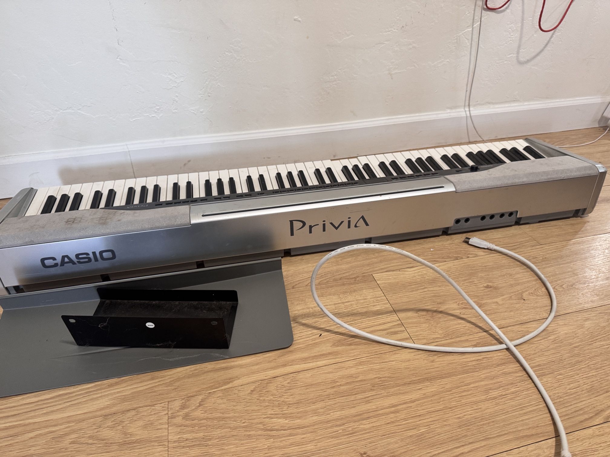 Casio Privia Digital Piano + Stand – $250