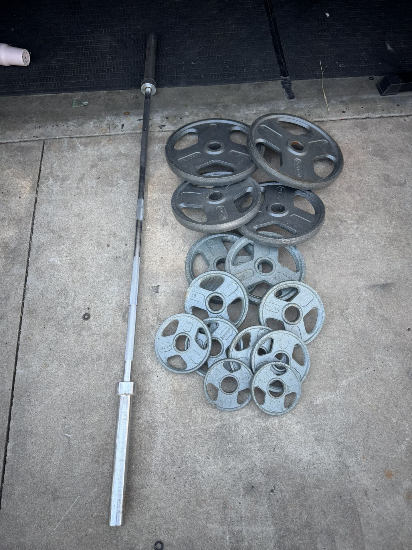Olympic weights set 255lbs total plus 7ft 45lbs bar