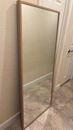 Ikea full length mirror with wood frame. 63x27.5