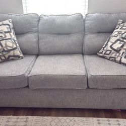 Grey Sofa  And Loveseat With Pillows 