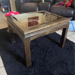 Wood coffee table with glass center